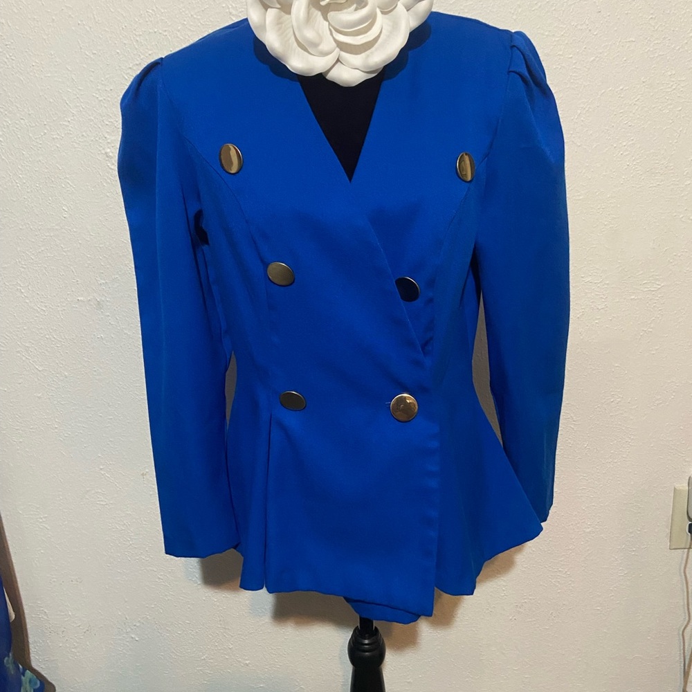 Blue vintage double breasted peplum jacket from the 80s or 90s.
